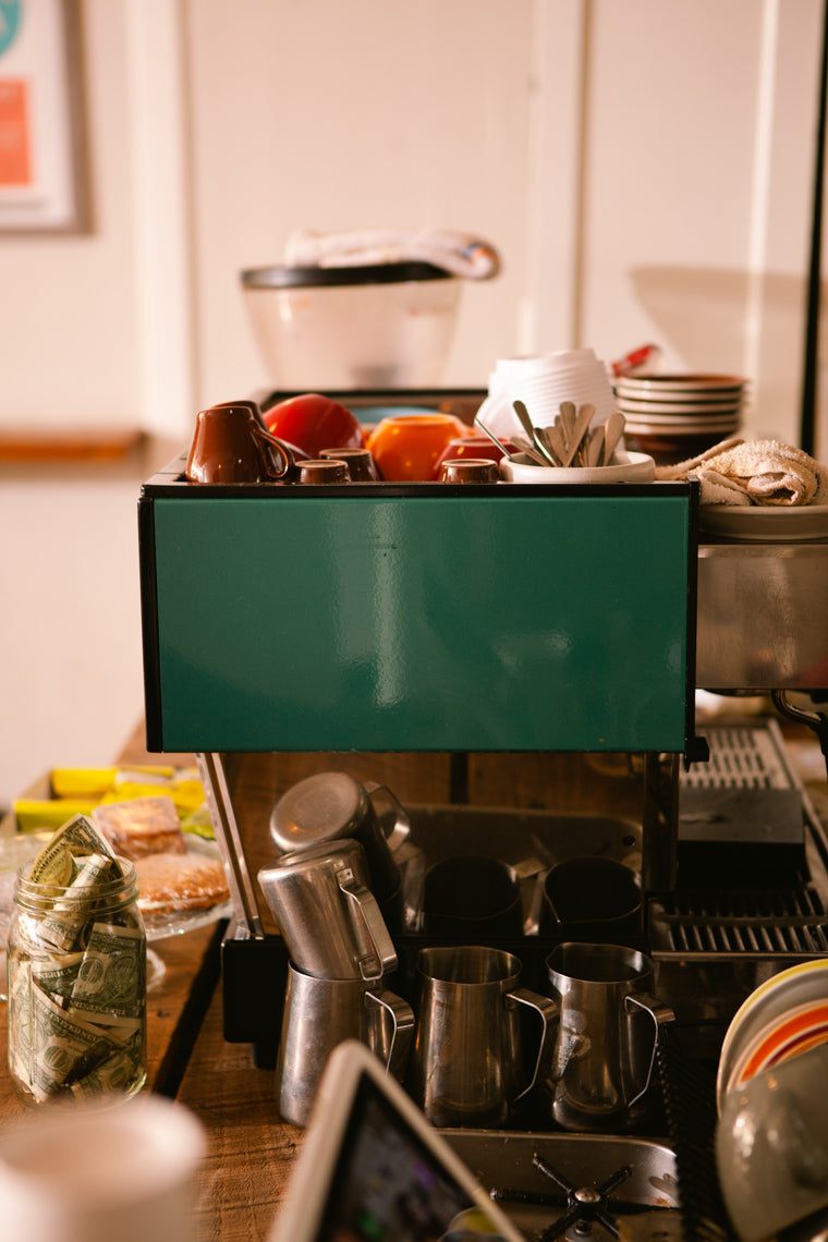 Redhawk Coffee Roasters espresso machine with cups