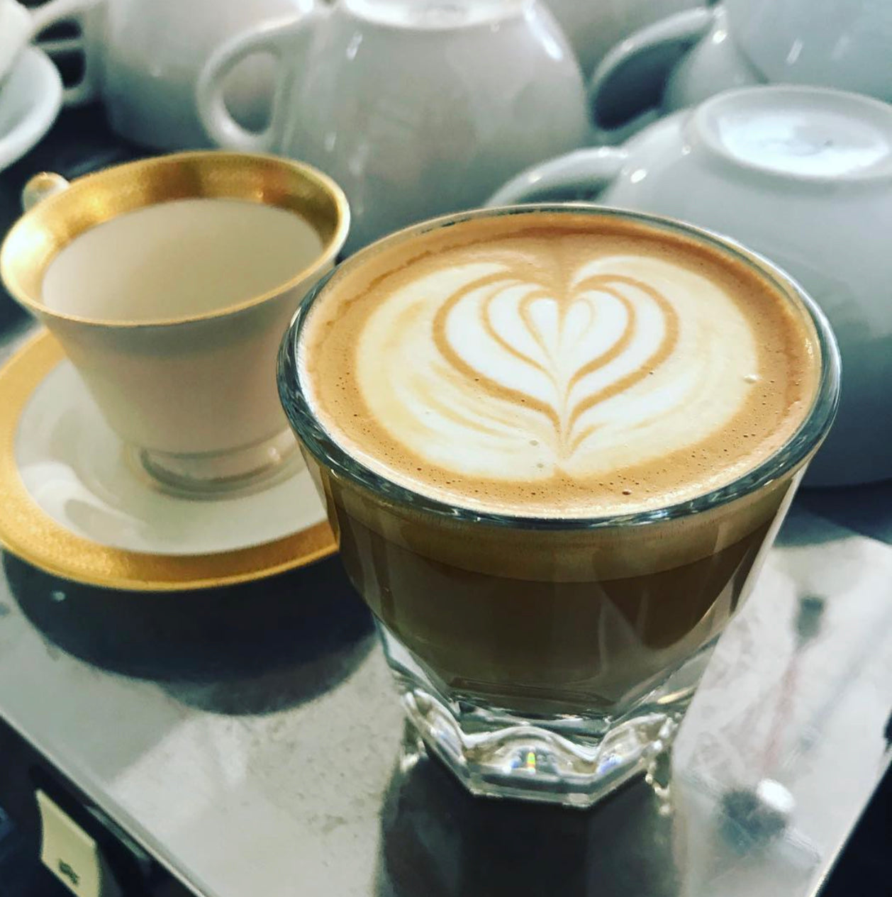 Redhawk Coffee Roasters latte art photo espresso pour