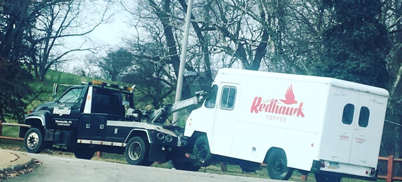 Redhawk Coffee Roasters truck getting towed after it broke down in the tunnel